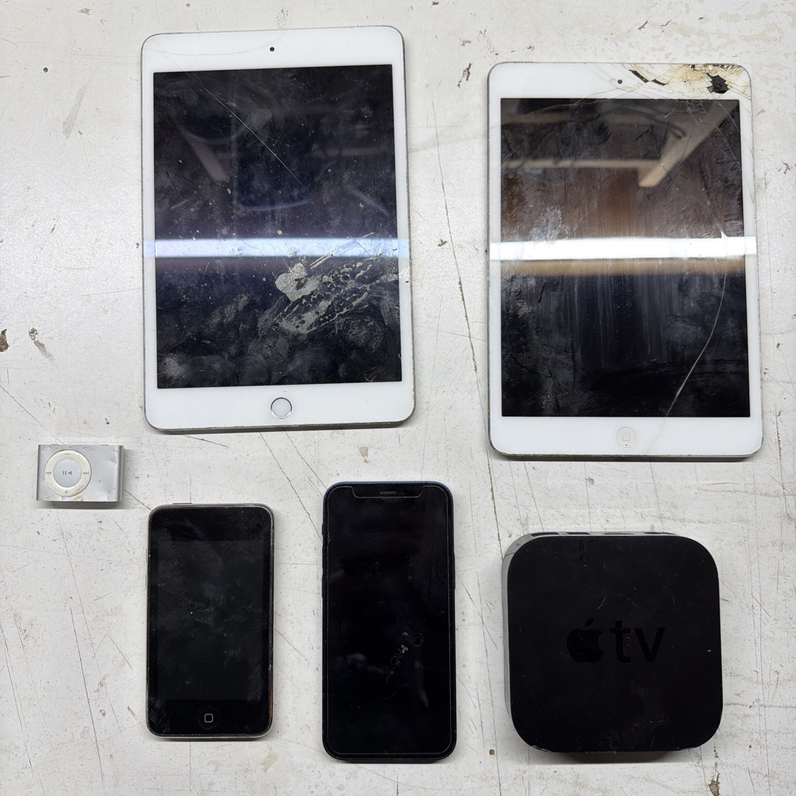 Lot of 6 Apple Devices – iPhone & 2 iPads Apple TV iPod – For Parts / Repair