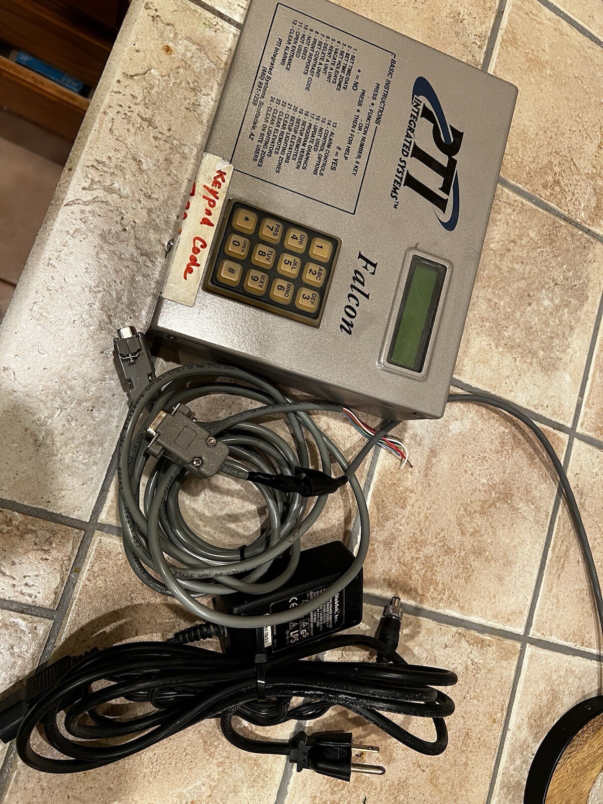 Used PTI Falcon 2000 Desktop Base Unit with keypad. Great Condition.