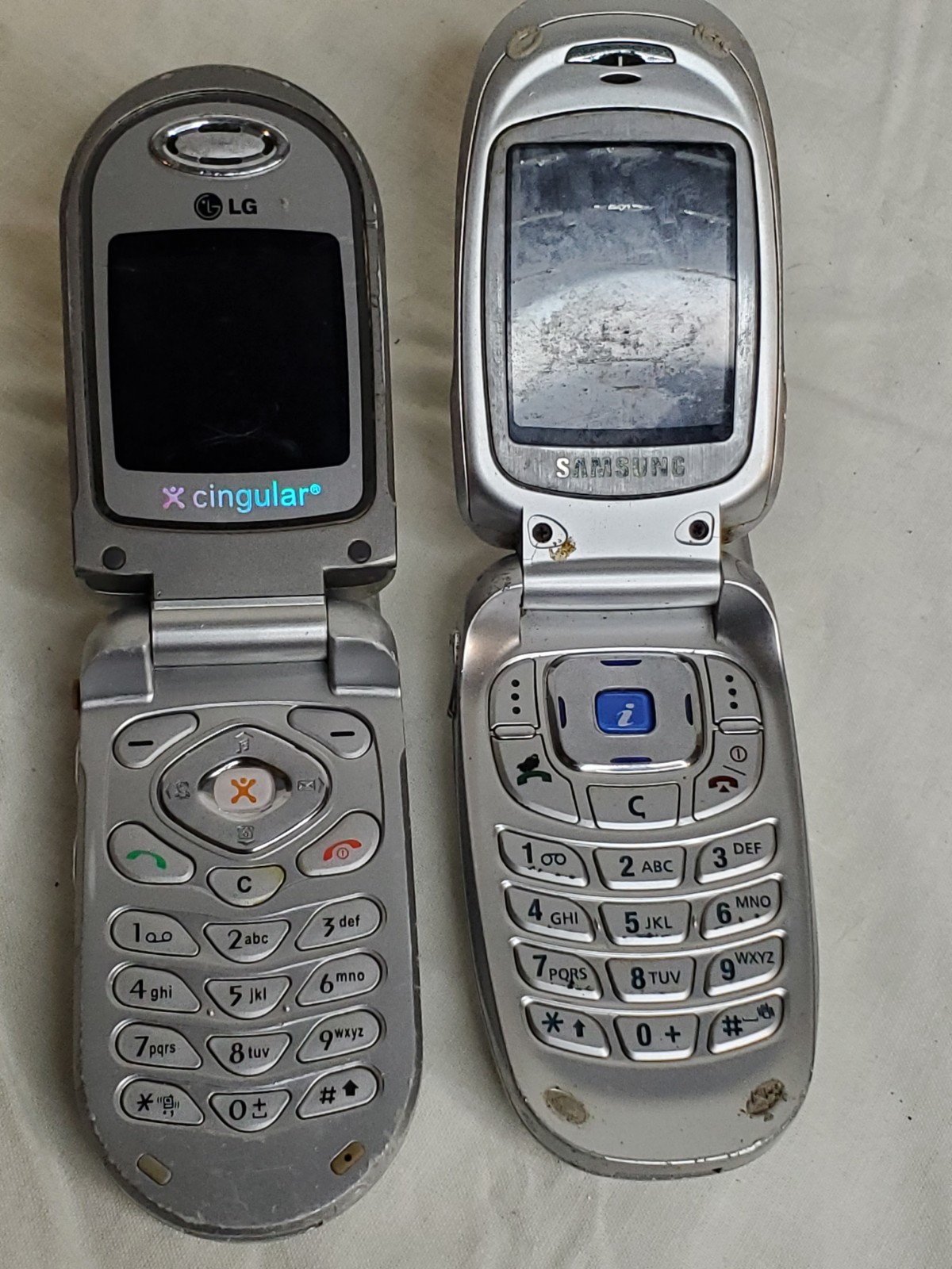 Junk Drawer Lot-Vtg. Electronics/Cell Phones/Cords/Sirius/Motorola/Samsung/AS IS