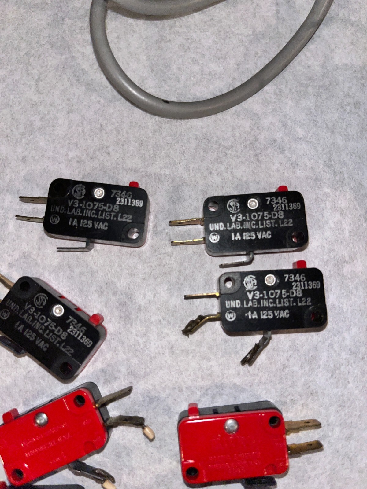 Lot of electronics. Synchron elec. Clock motor, micro switches and toggles, etc