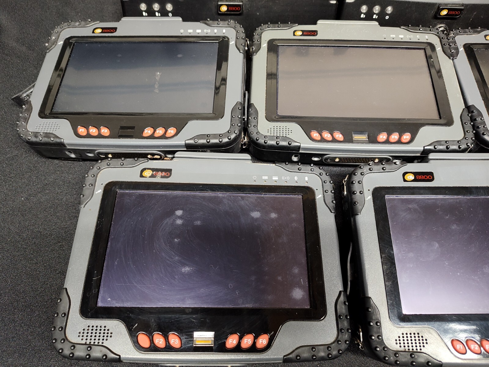 Mixed Lot of 5 DLI 8800 Tablets and 4 Charging Cradles