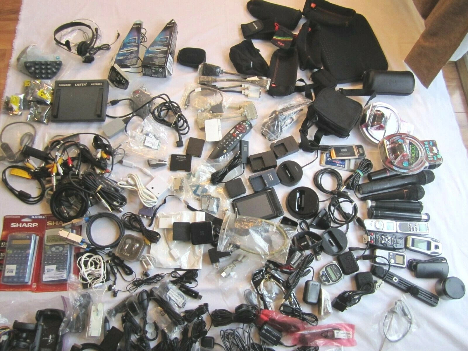 Mixed Lot of Electronics, remotes, battery chargers etc. L
