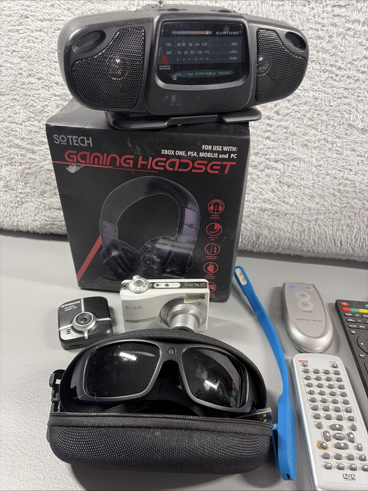Tech Lot Bundle Remotes Cameras Radio Gaming Head Set Lens – Untested As Is