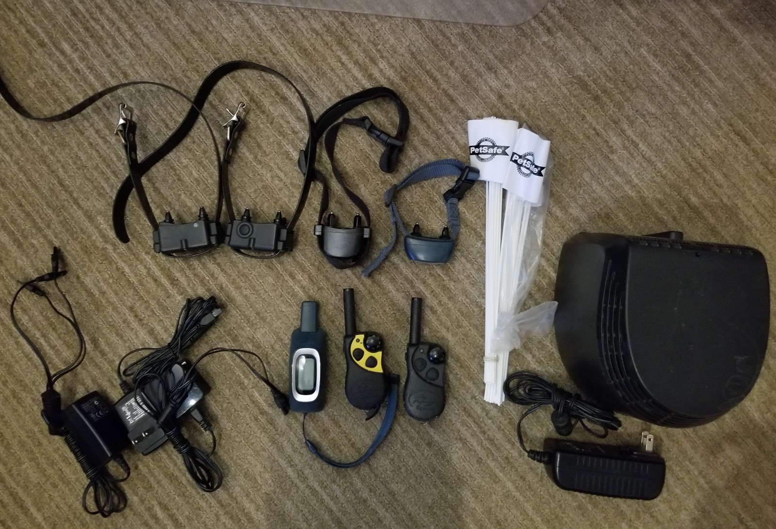 Lot of electronic collars, remotes and PetSafe perimeter fence