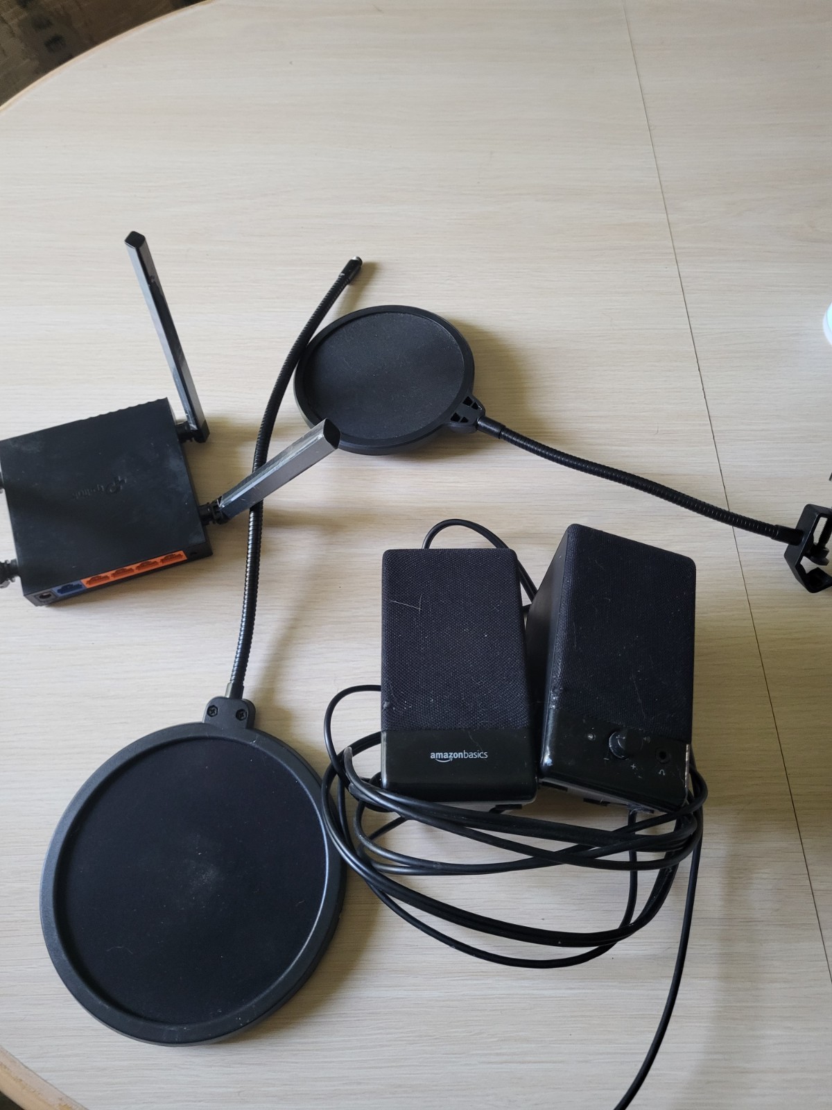 AmazonBasics speakers. 2 microphone pop shields. wifi router