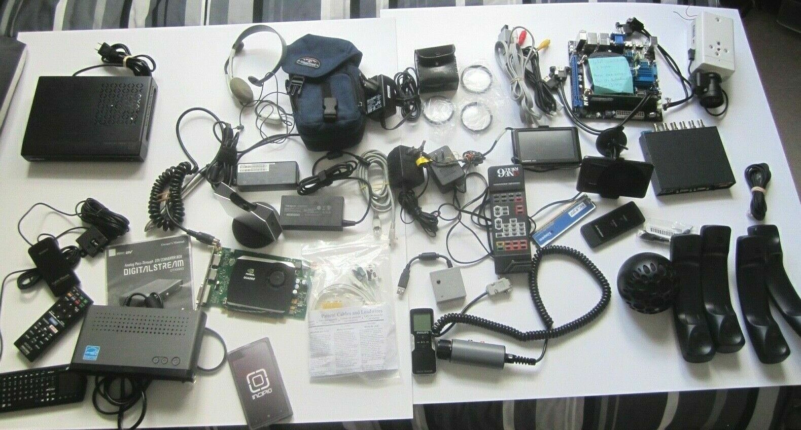 Mixed Lot of Electronics, remotes, AC Adapters, GPS & more….. NO RETURNS M