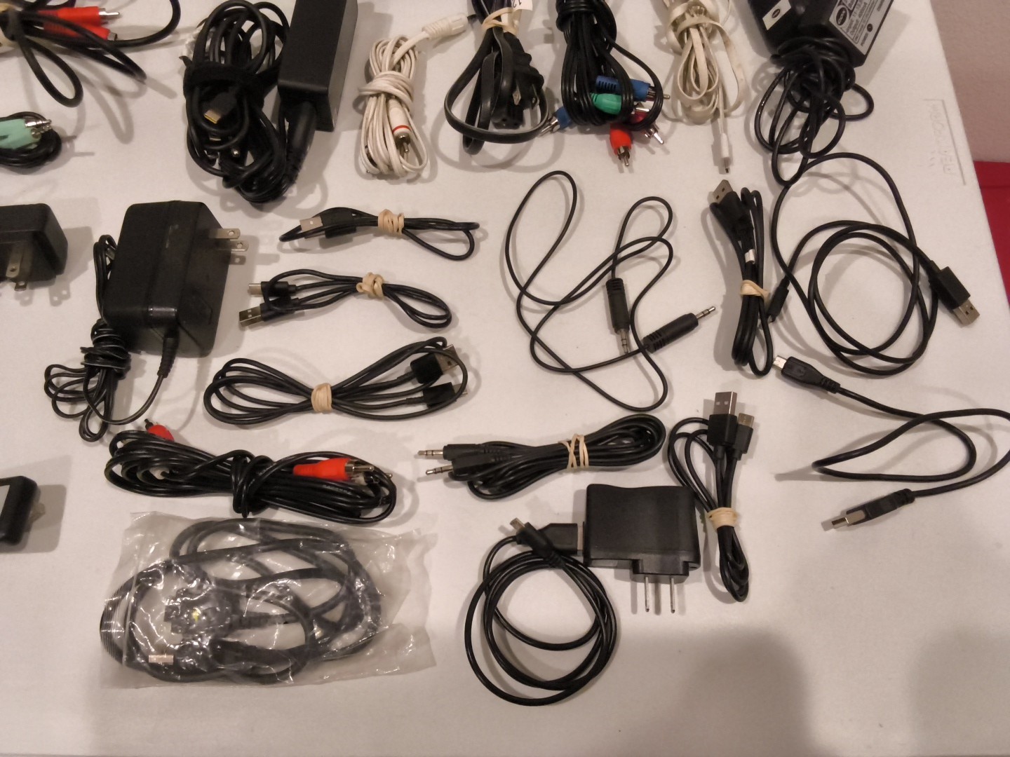 Huge Lot Of Electronic Chargers, Cables, And Remotes