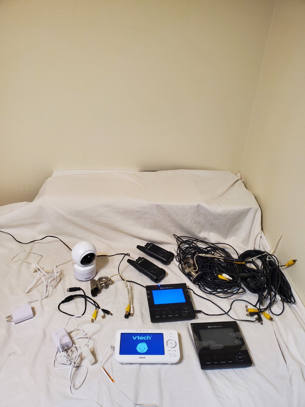“Mixed Lot: VTech Baby Monitor, Surveillance Cameras, Walkie-Talkies, and…
