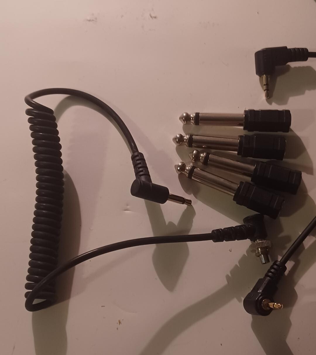Never Used! VARIOUS CORDS WITH ADAPTORS – AS SHOWN SOLD AS LOT