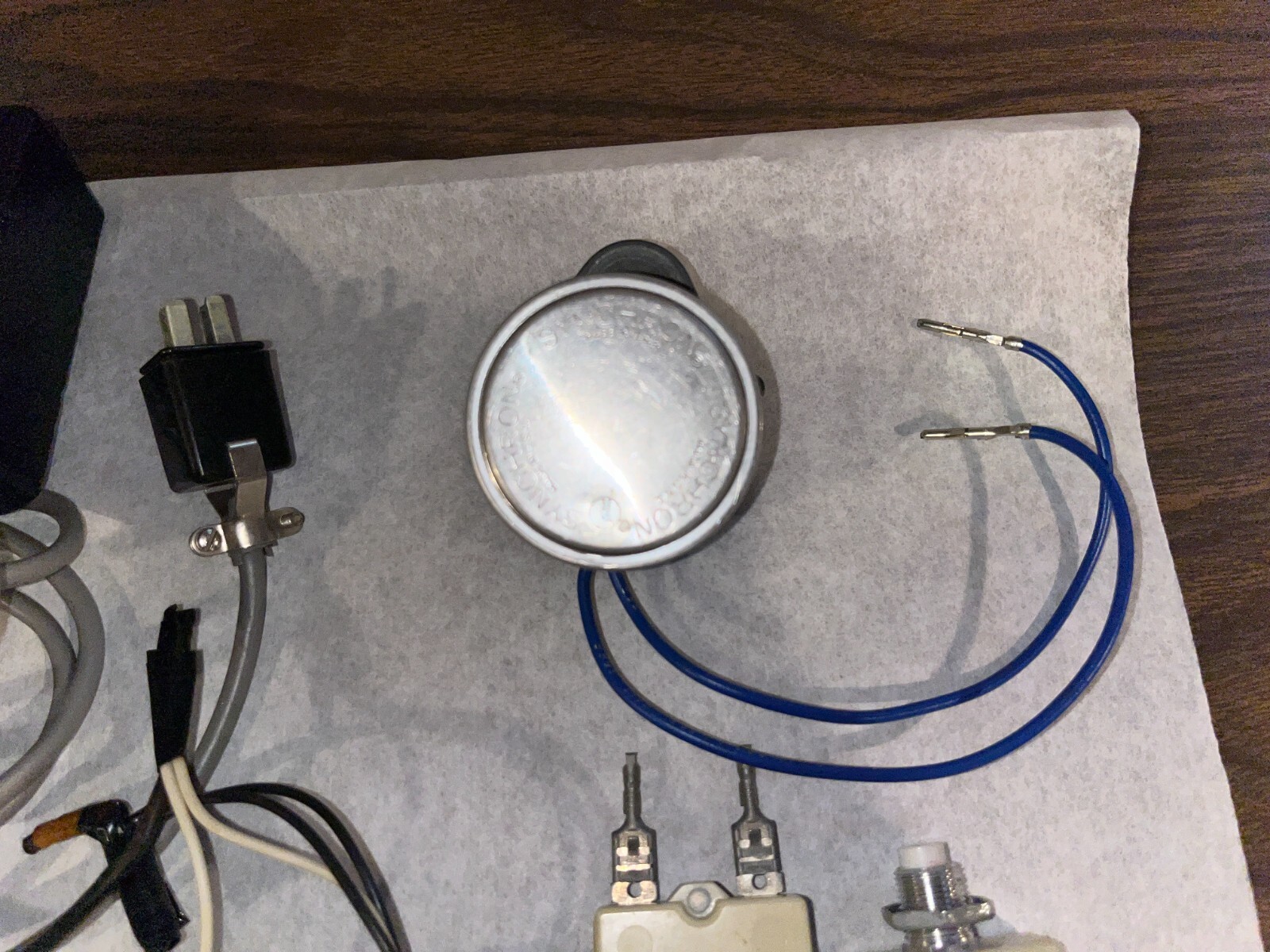 Lot of electronics. Synchron elec. Clock motor, micro switches and toggles, etc