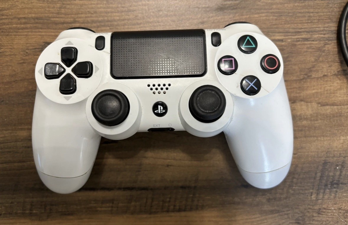 PS4 Slim Console 1TB + 2 Controllers (White & Camo) + Cables – Tested Working