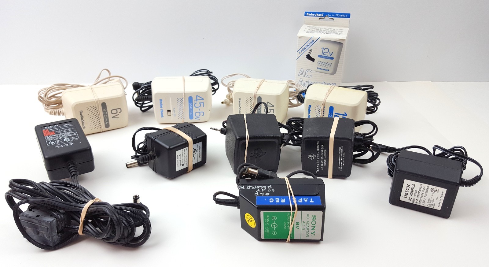 Lot of 11 Assorted Power Adapters Radio Shack Ti Epson Sony etc Vintage