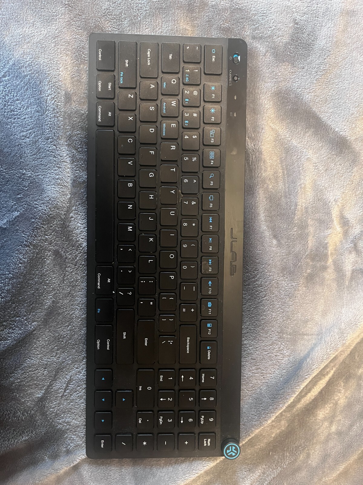 JLab Wireless keyboard W/ sound knob USB connector Black and white