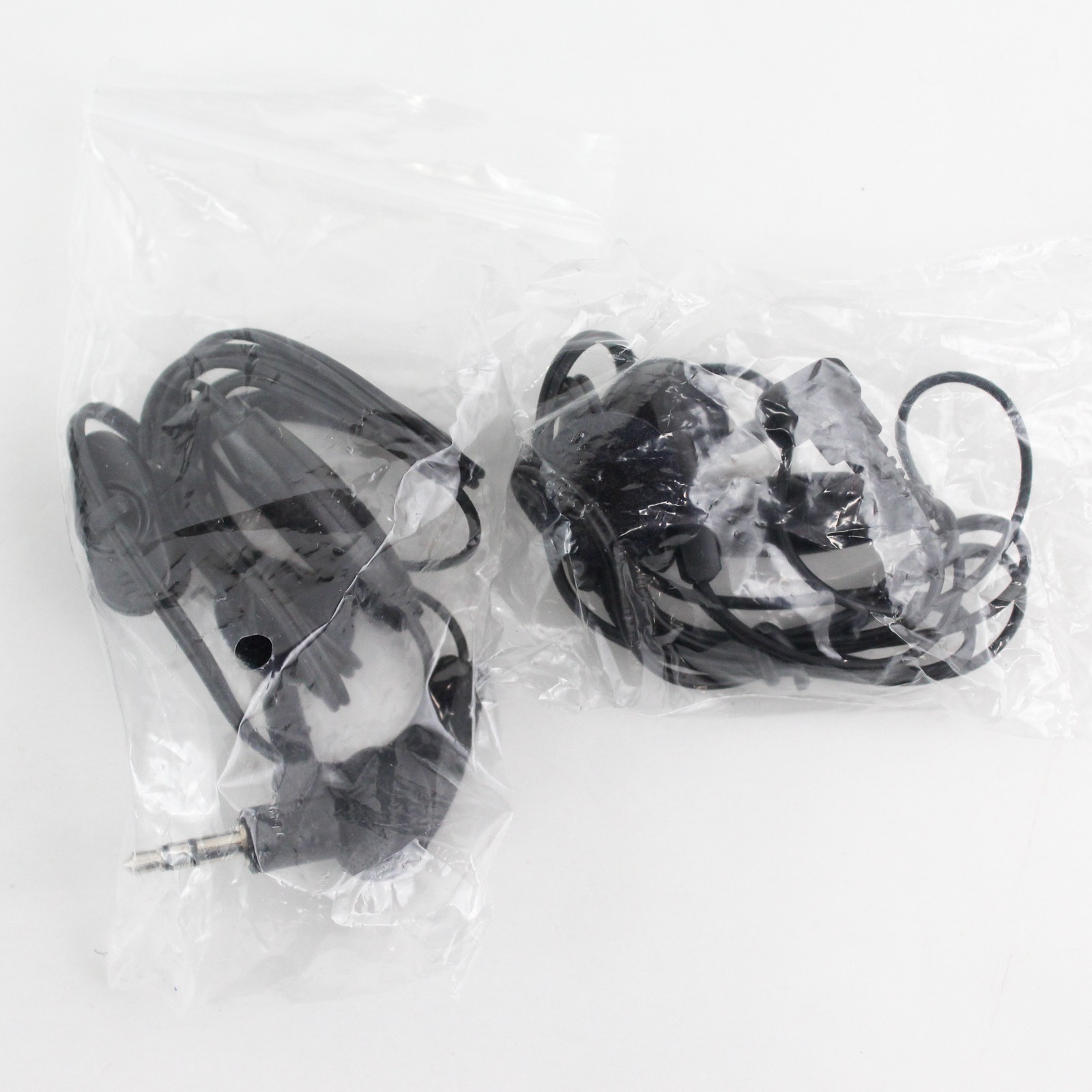 Lot of 4 Electronic Accessories 2 AC/DC Power Adapters & 2 Earphones w/Mic