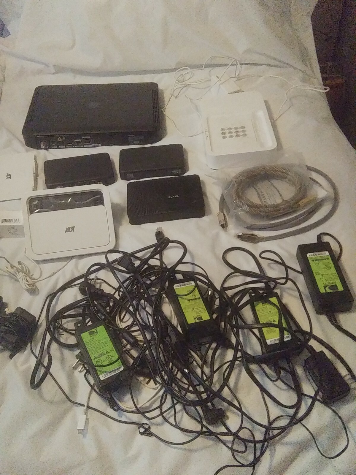Mixed Lot of Electronics Direct TV, ZyXel, ADT