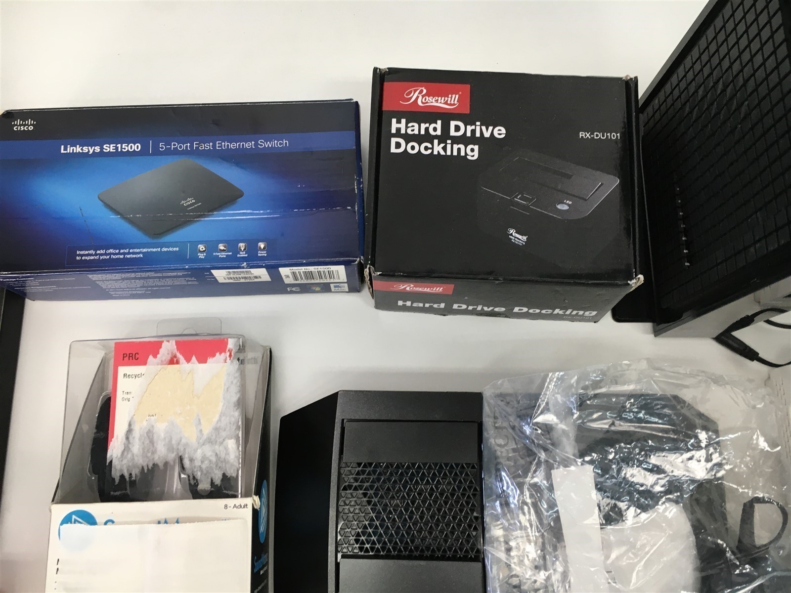 Lot of Headphones Hard Drive Wifi Modem by Linksys Rosewill WD Digipower & More
