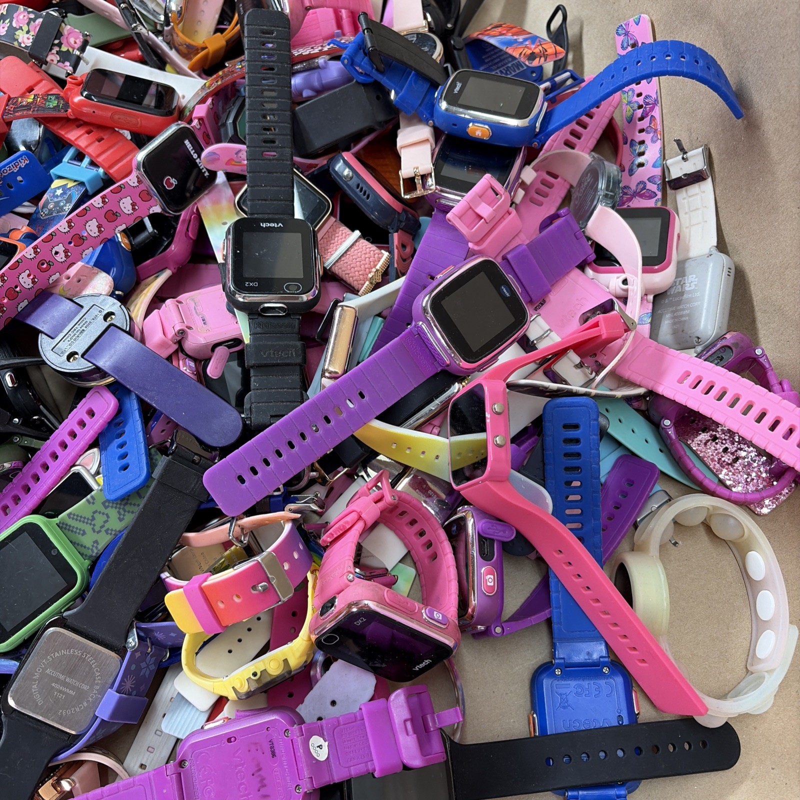 Lot of 200 Kids Smart Watches Assorted Lot vTech, Accutime, iTech, UNTESTED