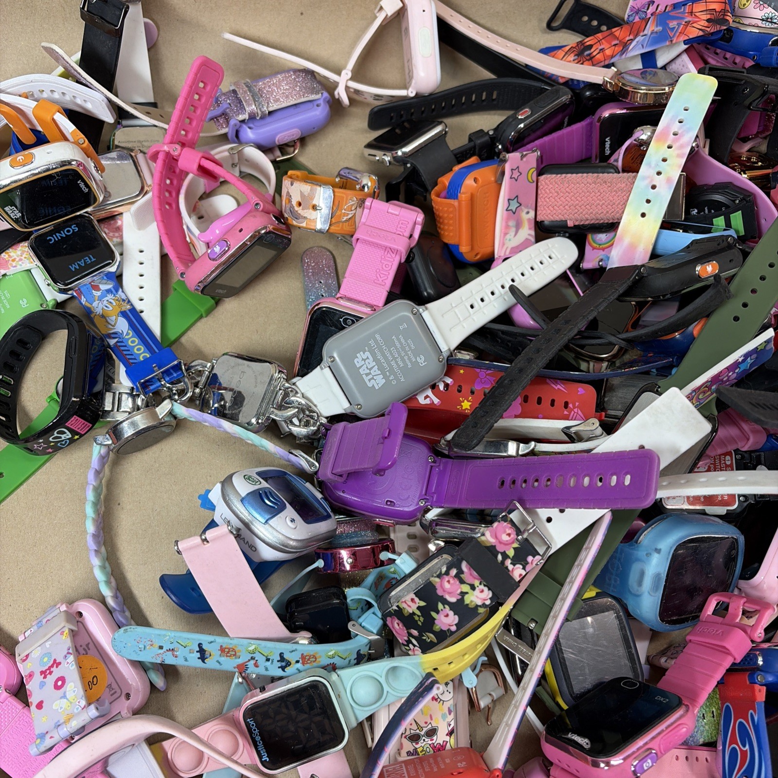 Lot of 200 Kids Smart Watches Assorted Lot vTech, Accutime, iTech, UNTESTED