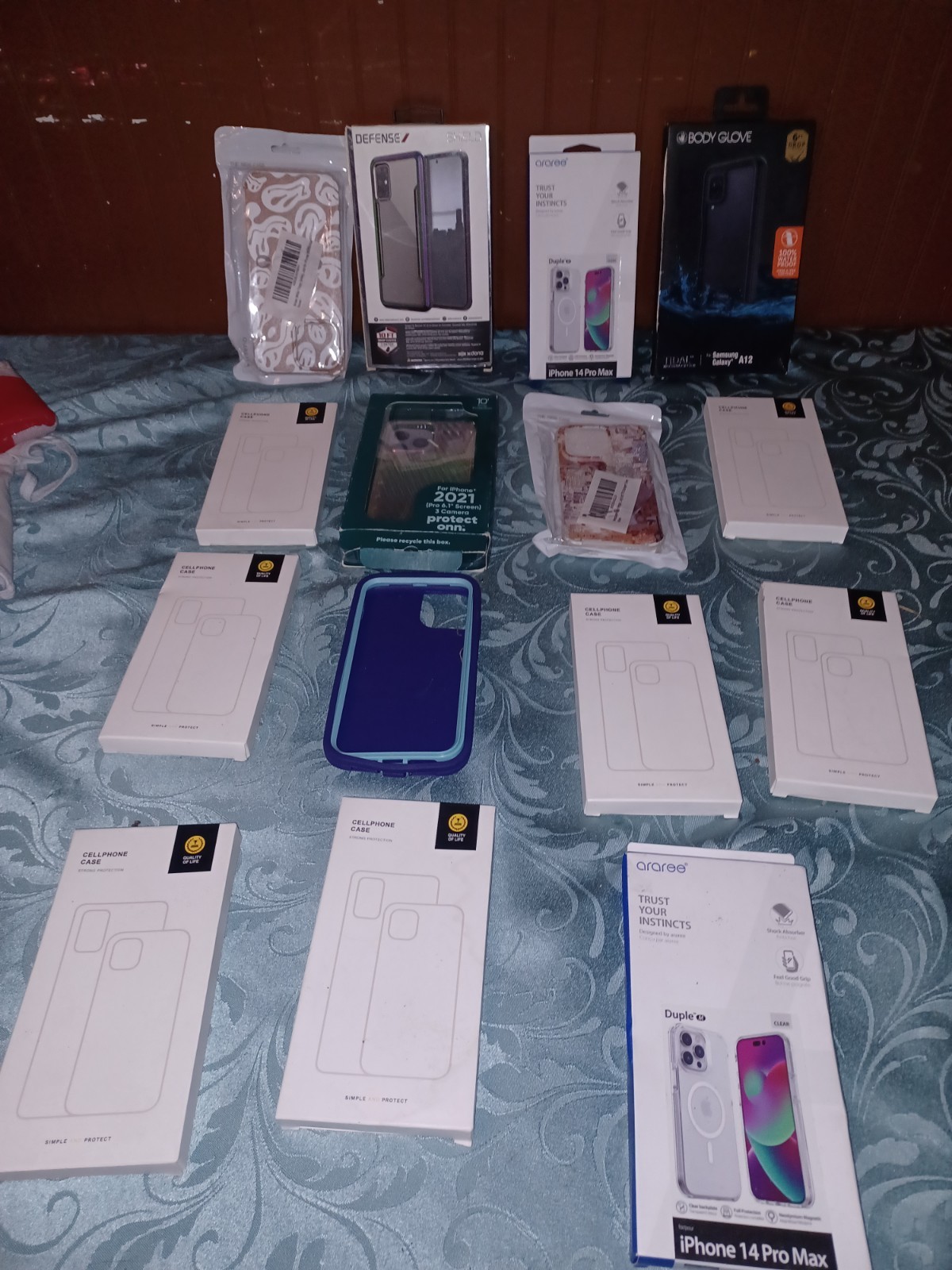 Variety Of Opened And New Electronics Batteries Phones Cases And Ect