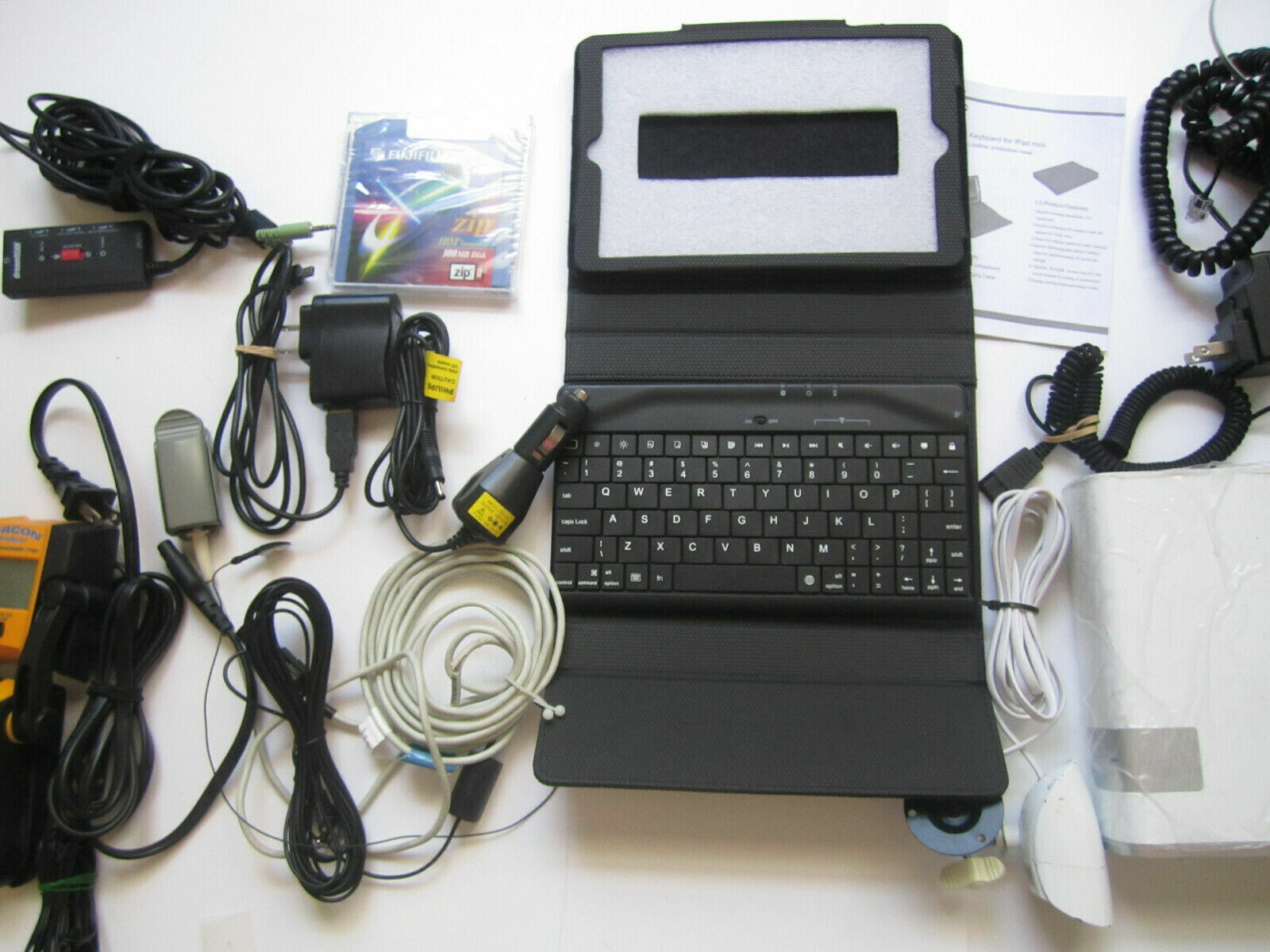 Mixed Lot of Electronics, remotes, Logitech receivers, PSP Games and more.. H