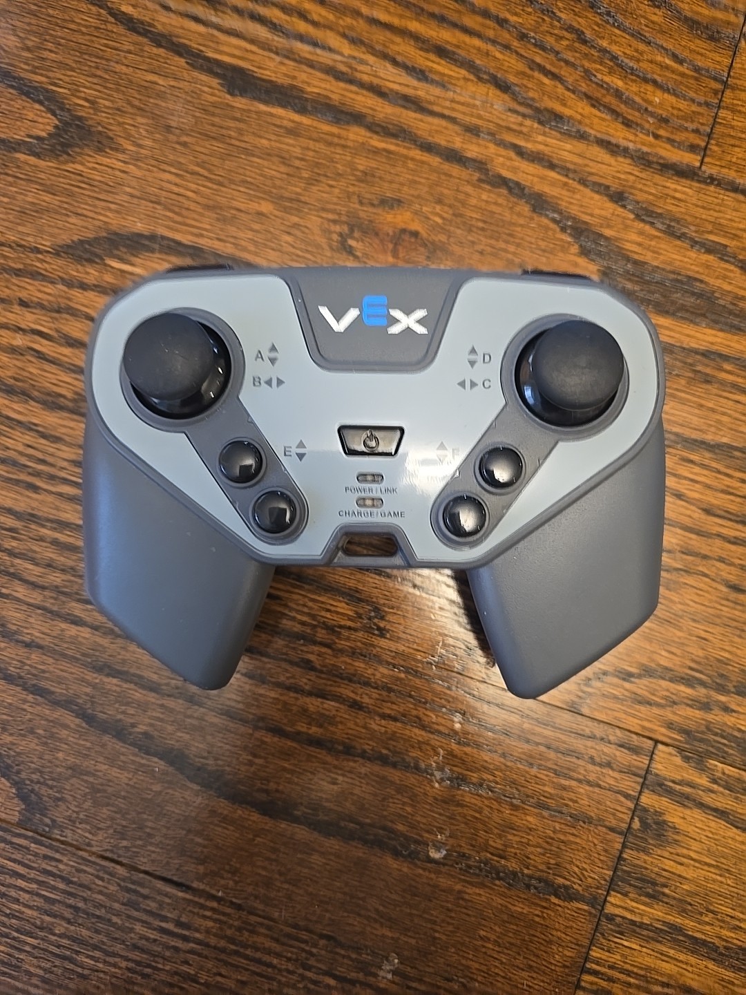 Vex.iq gen 1 controller, battery, brain, and charger.