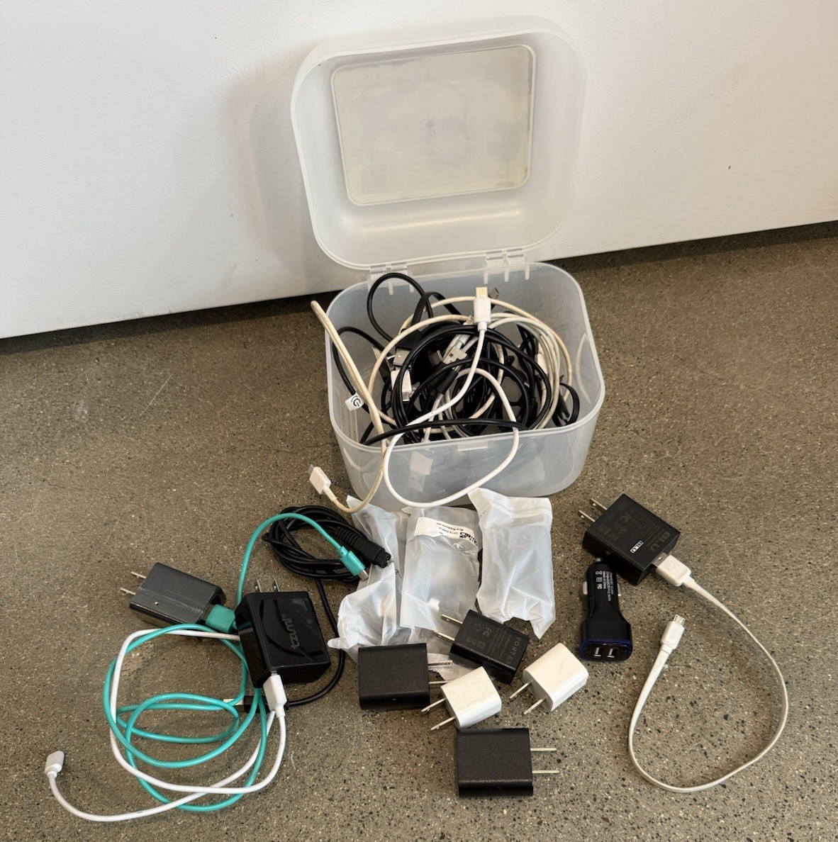 TUMI Mixed Lot Chargers, Cables & Wall Adapters w/ Storage Box