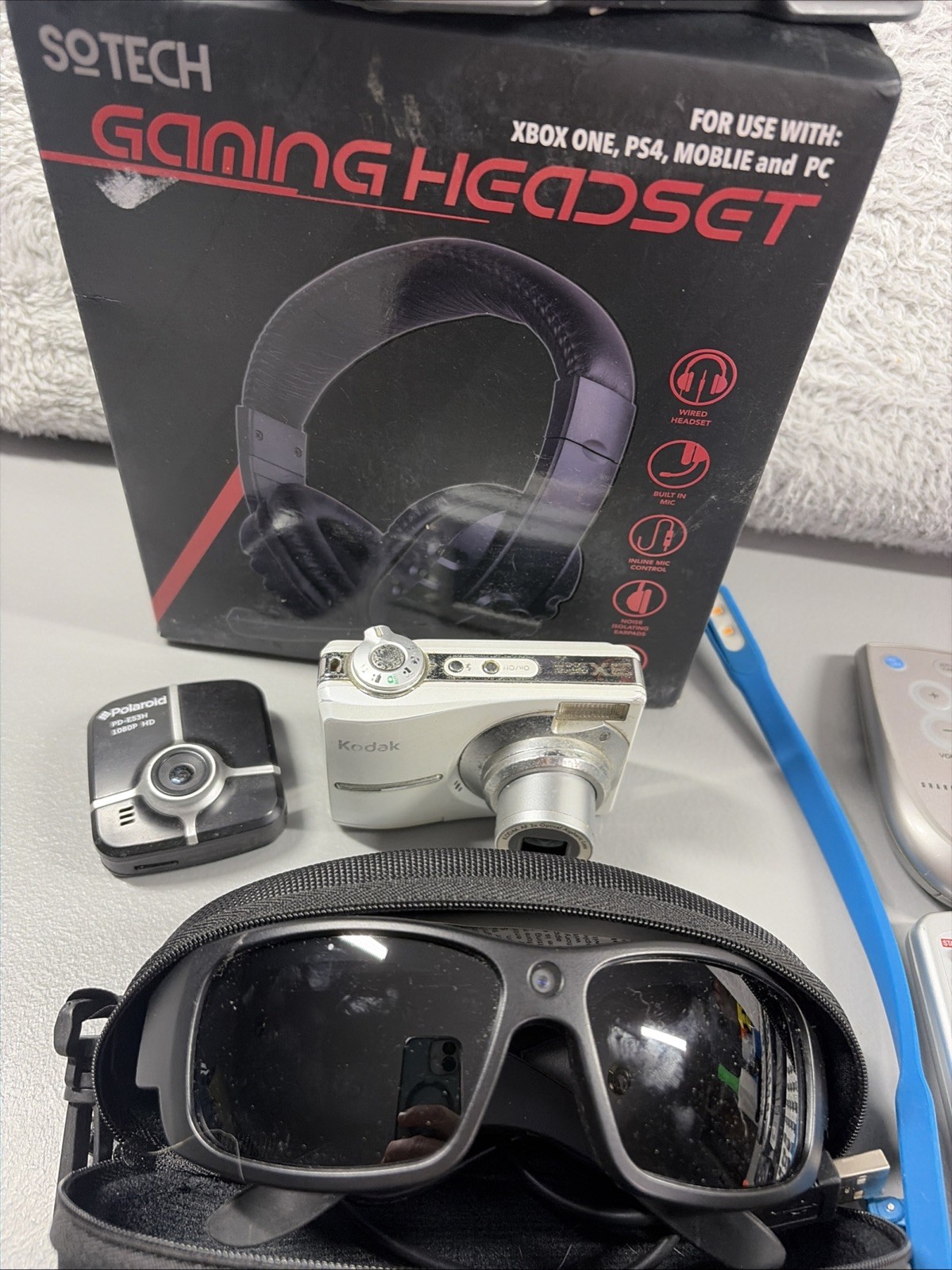 Tech Lot Bundle Remotes Cameras Radio Gaming Head Set Lens – Untested As Is
