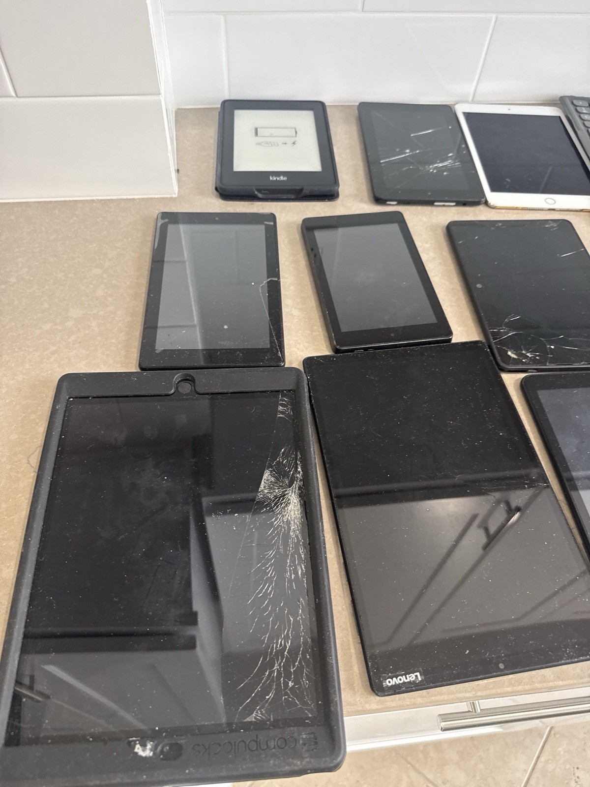 All the tablets in the photo; not sold individually—sold for parts only.