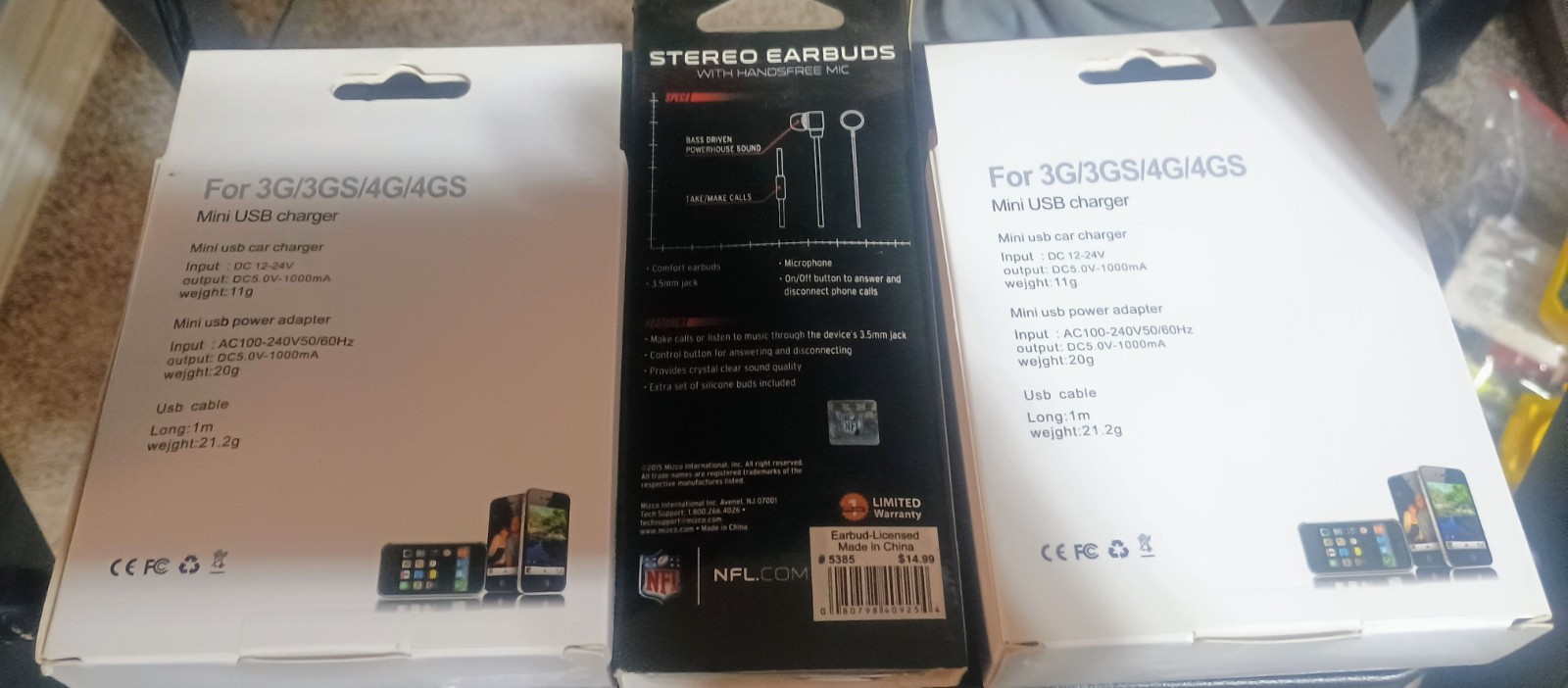 iPhone chargers, adapters, case, earbuds, and a mini display port to HDMI