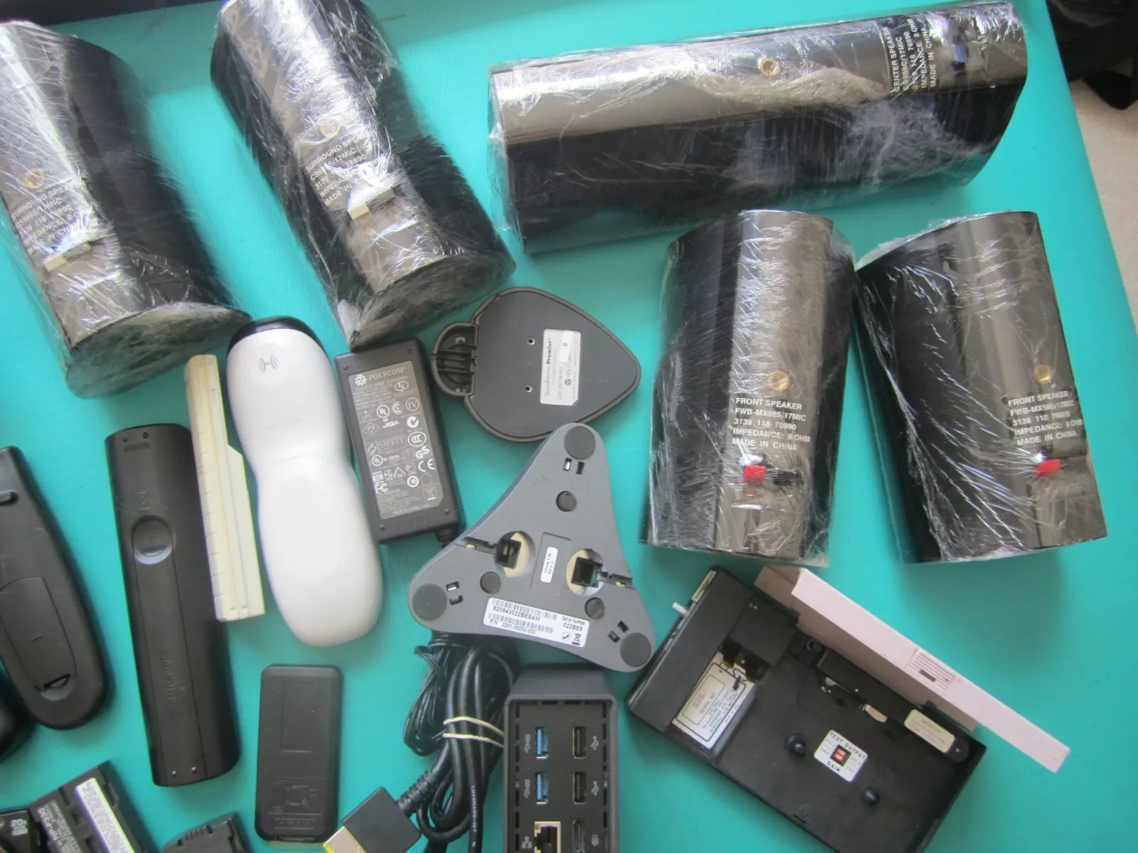 Mixed Lot of Electronics speakers, remote controls, batteries, and more W