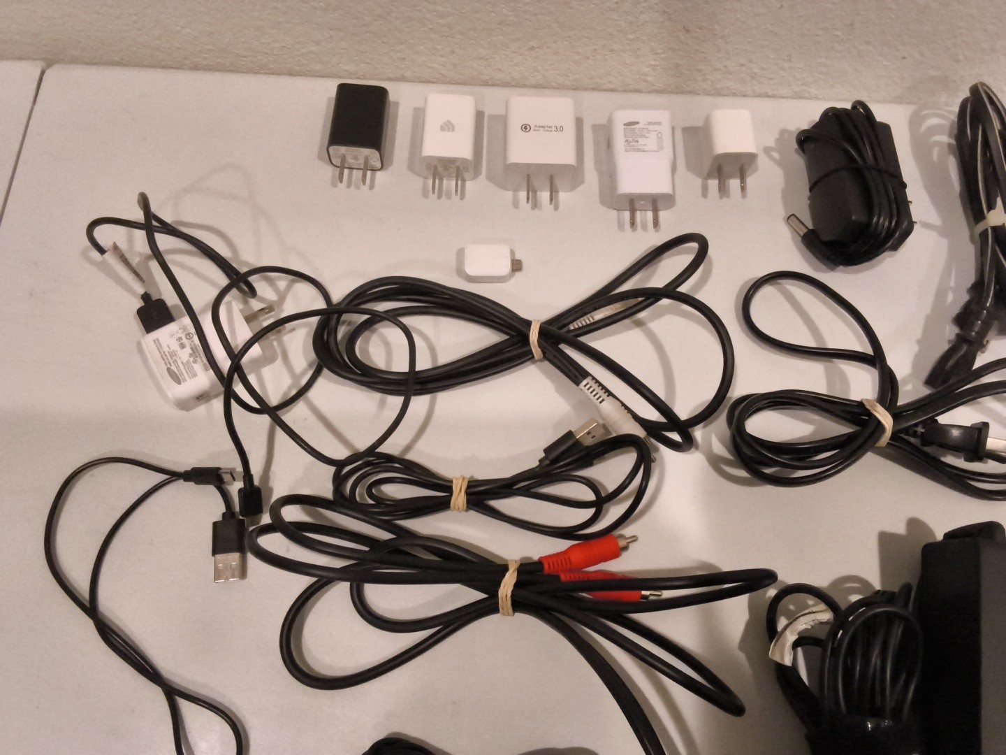 Huge Lot Of Electronic Chargers, Cables, And Remotes