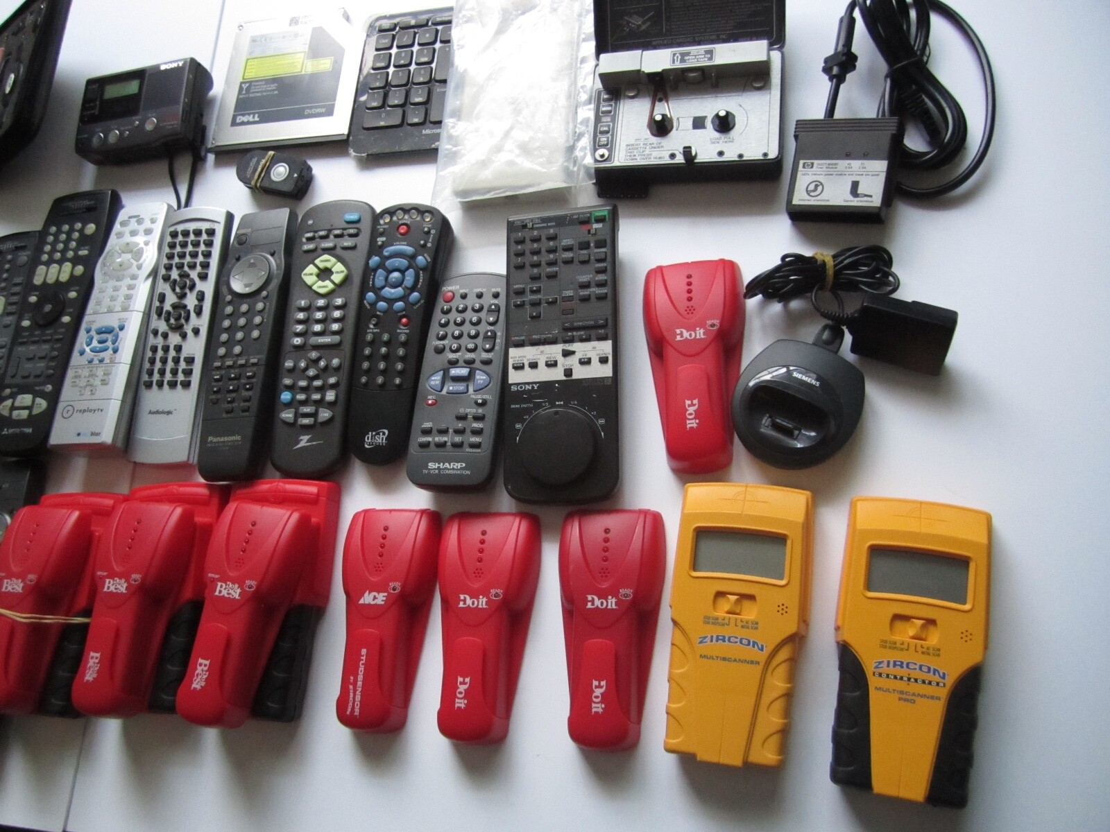 Mixed Lot of Electronics, remotes, Stud finder and more. S
