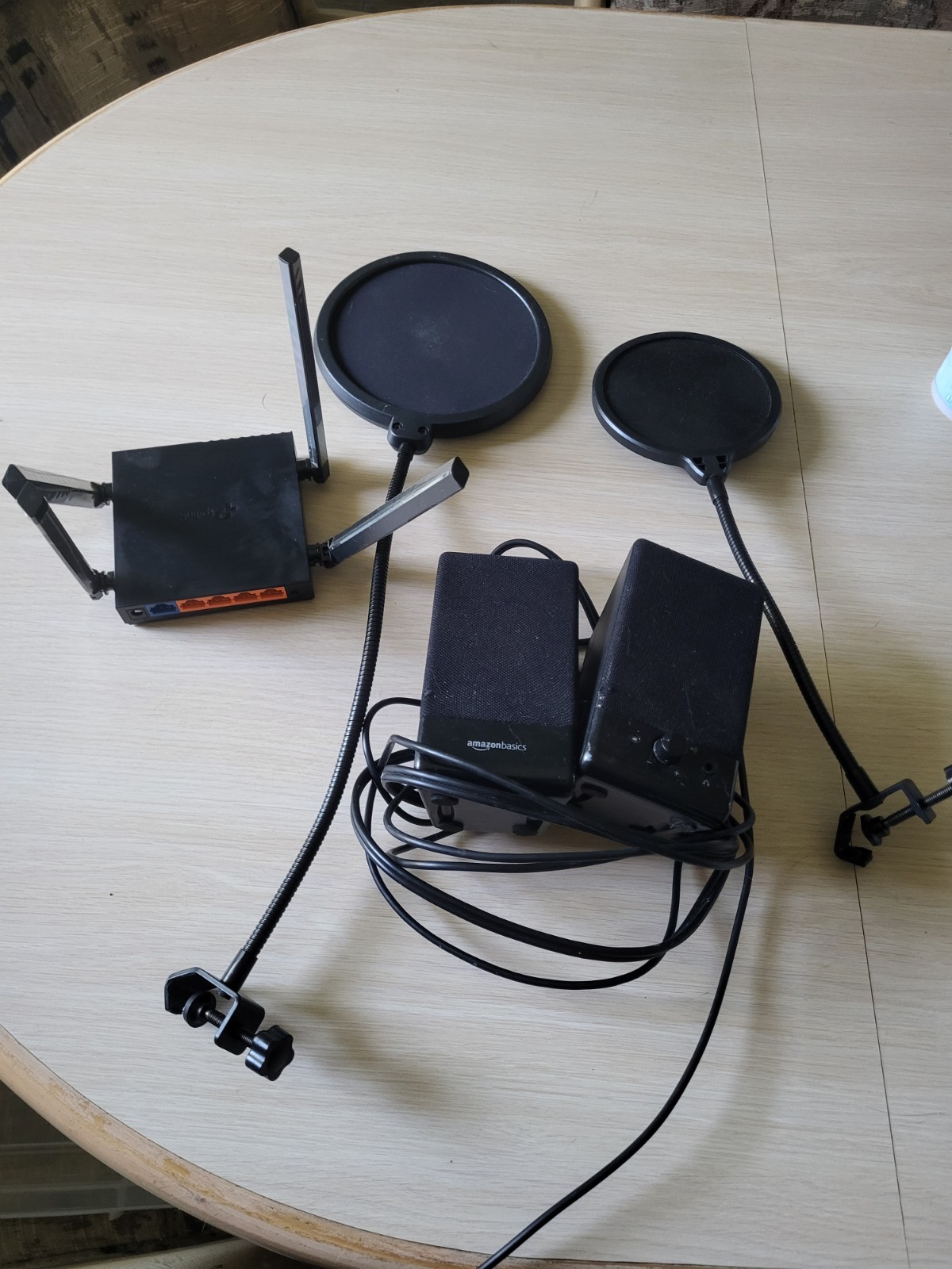 AmazonBasics speakers. 2 microphone pop shields. wifi router