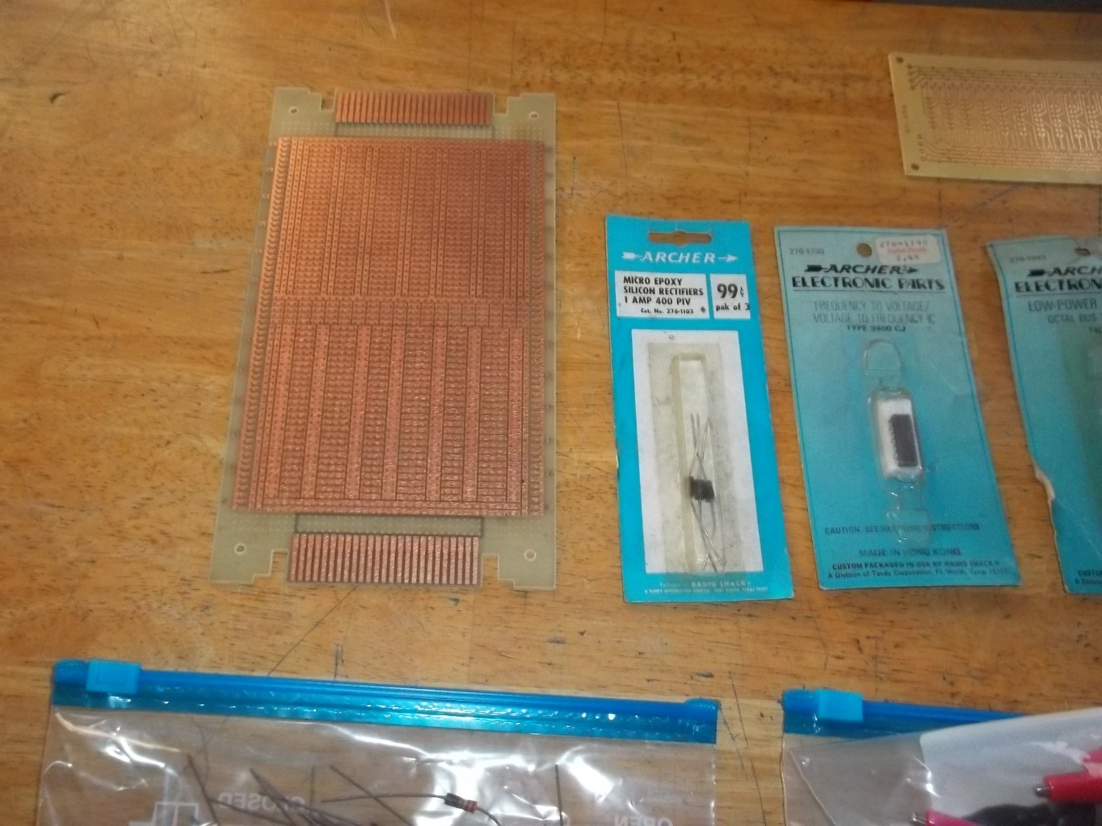 lot of electronics components, resistors, capacitors, relays, transistors, etc.