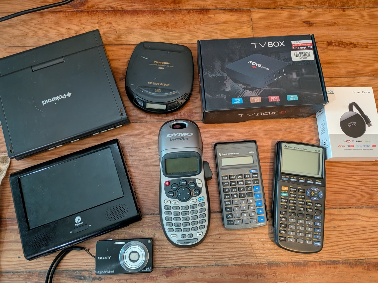 Electronics Lot -Polaroid Portable DVD Player Sony Camera Texas instruments