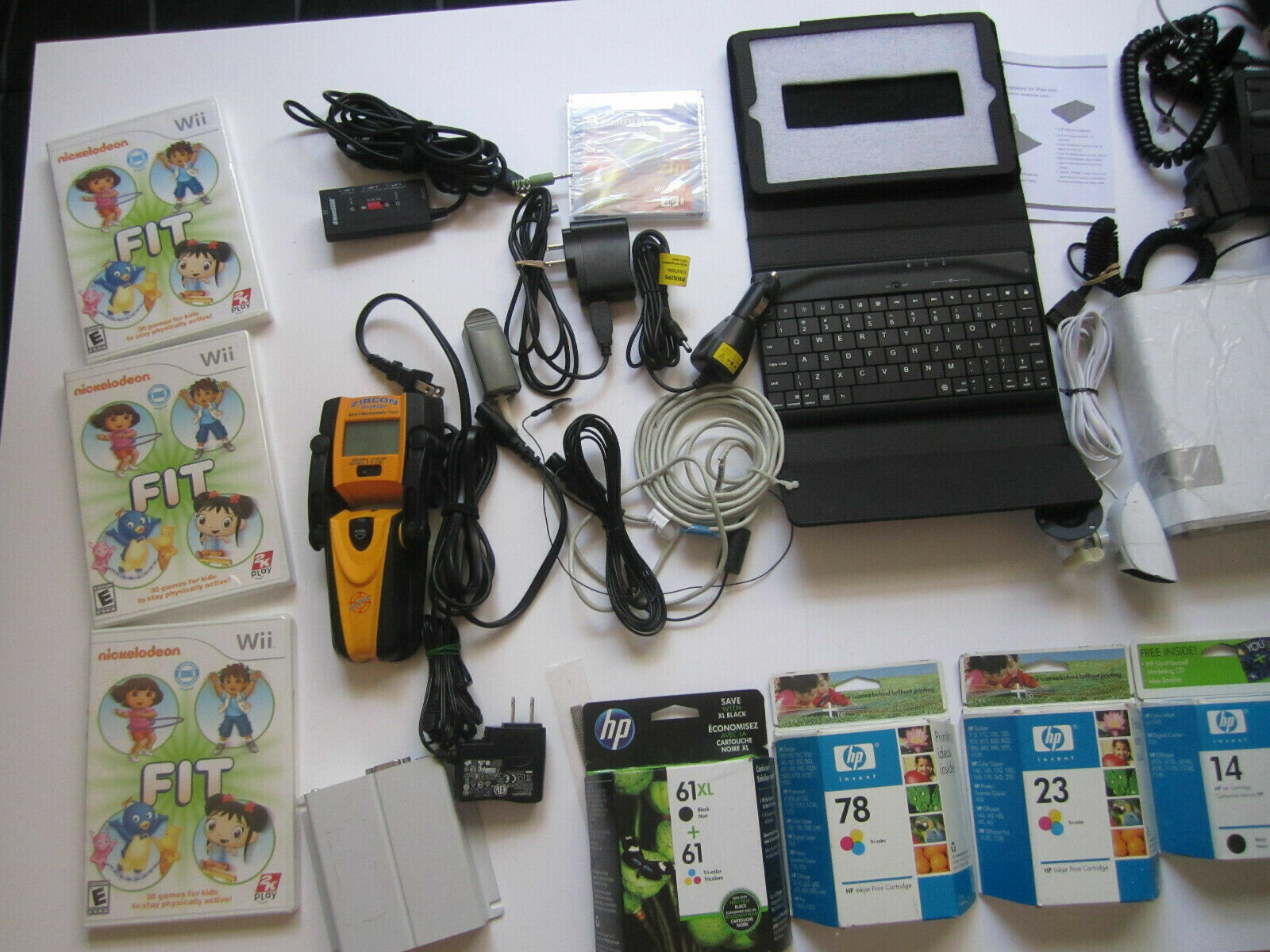Mixed Lot of Electronics, remotes, Logitech receivers, PSP Games and more.. H