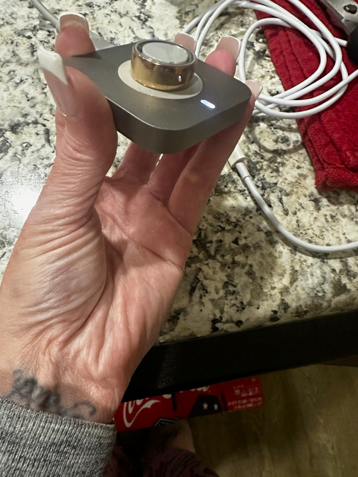 Oura Ring Gen 4, Size 4. Does include the charger and the box.